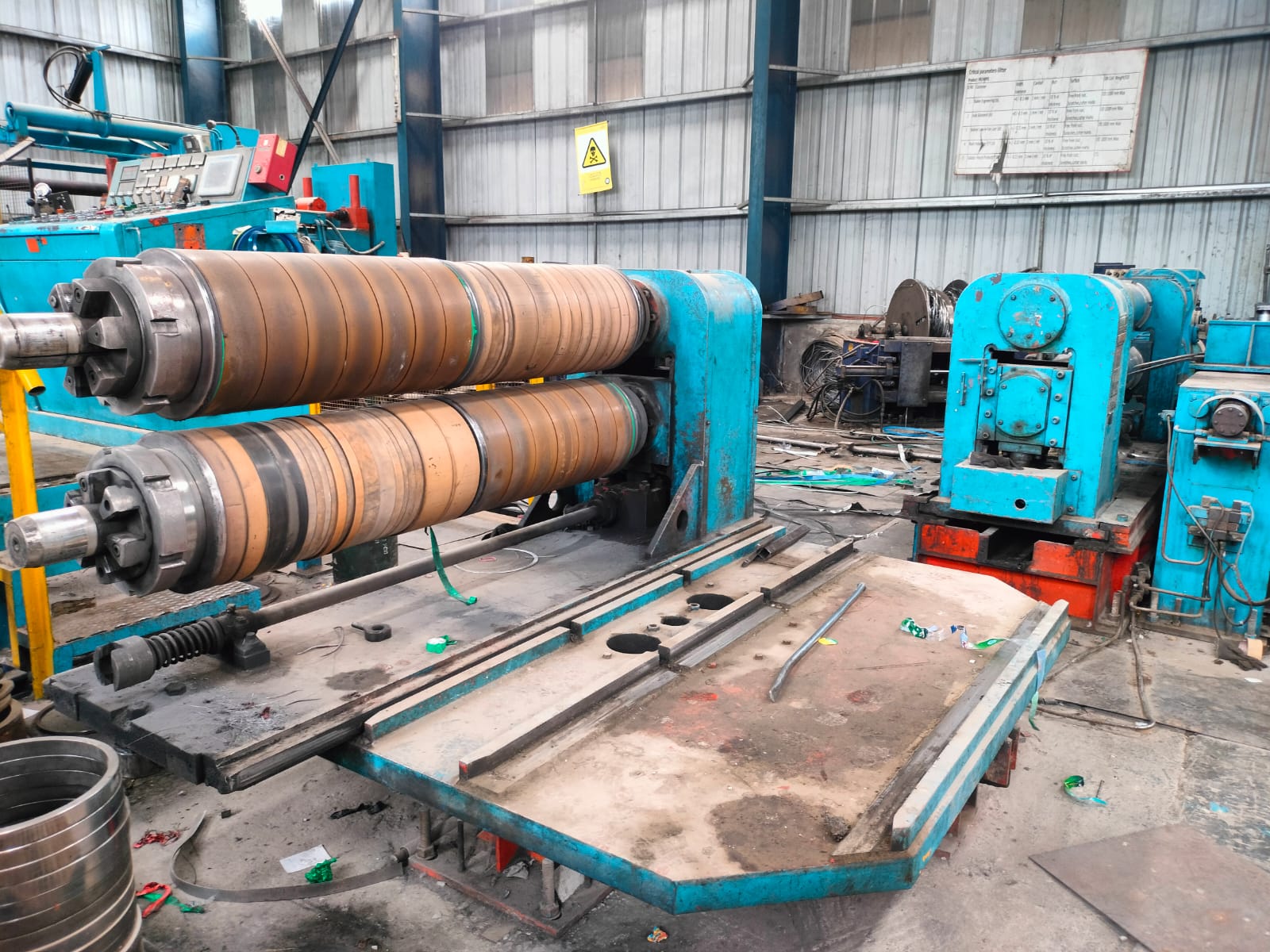Hydraulic recoiler arm and tension pad